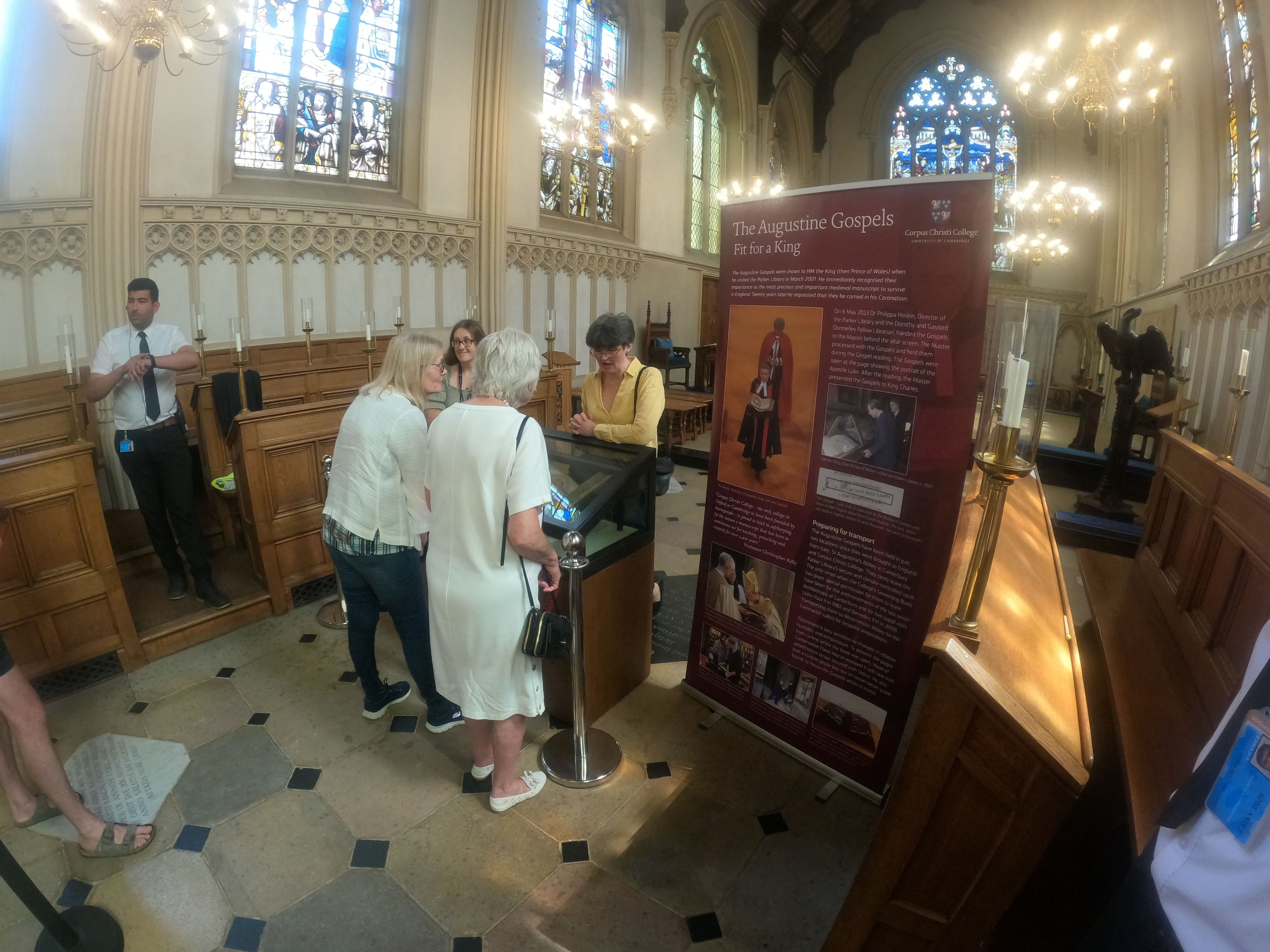 Philippa in the Chapel with the Augustine Gospels, on display for staff and members of the public.