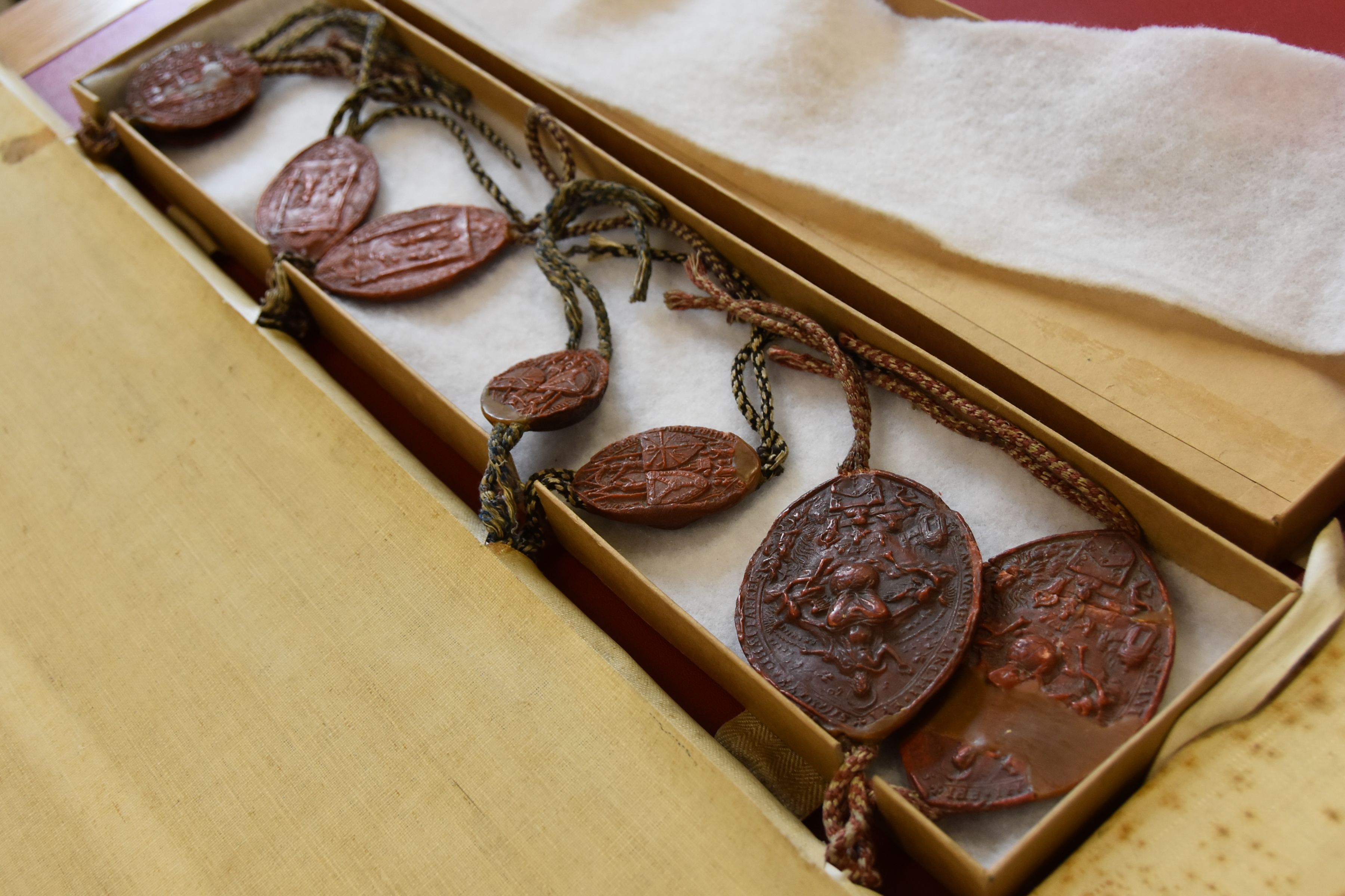 Seals from two sections of of the four-part indenture of 1574 concerning the care of Matthew Parker’s books. They include the seals of Parker himself and of the Colleges of Corpus Christi, Gonville & Caius and Trinity Hall.