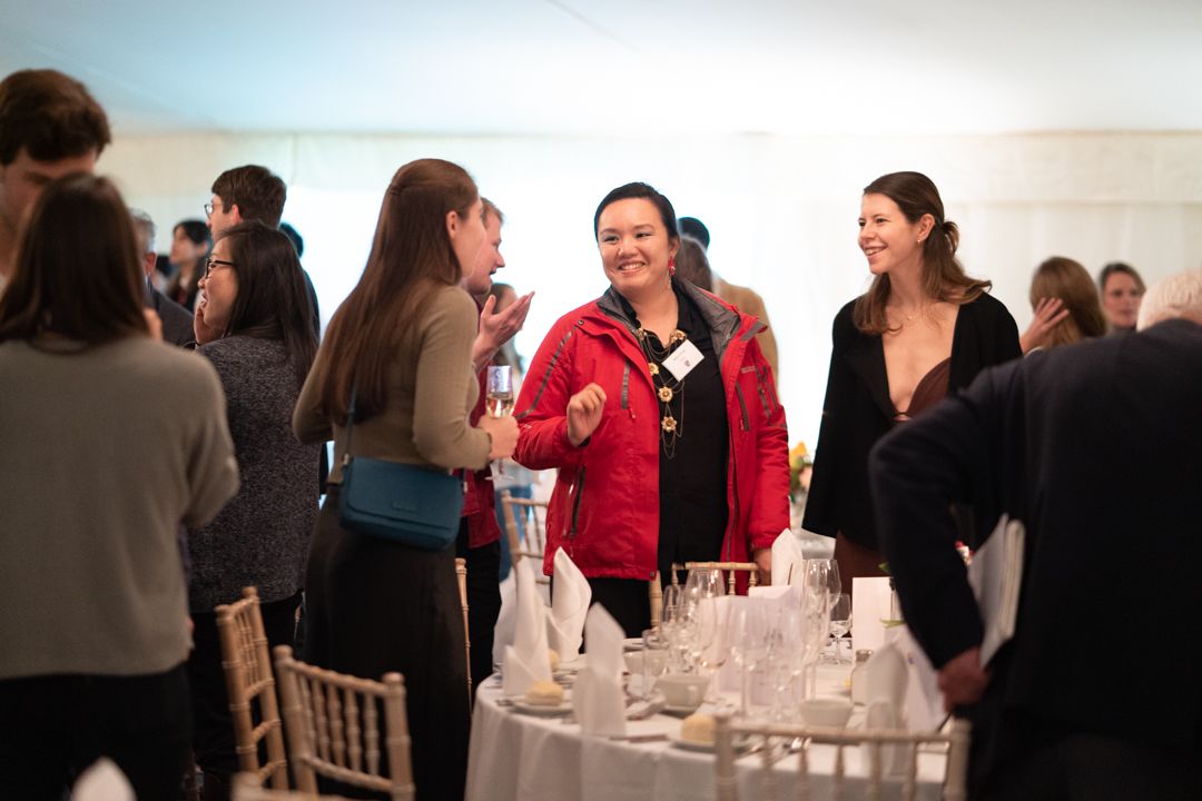 Fellow Dr Betty Chung chats with postgraduate students.