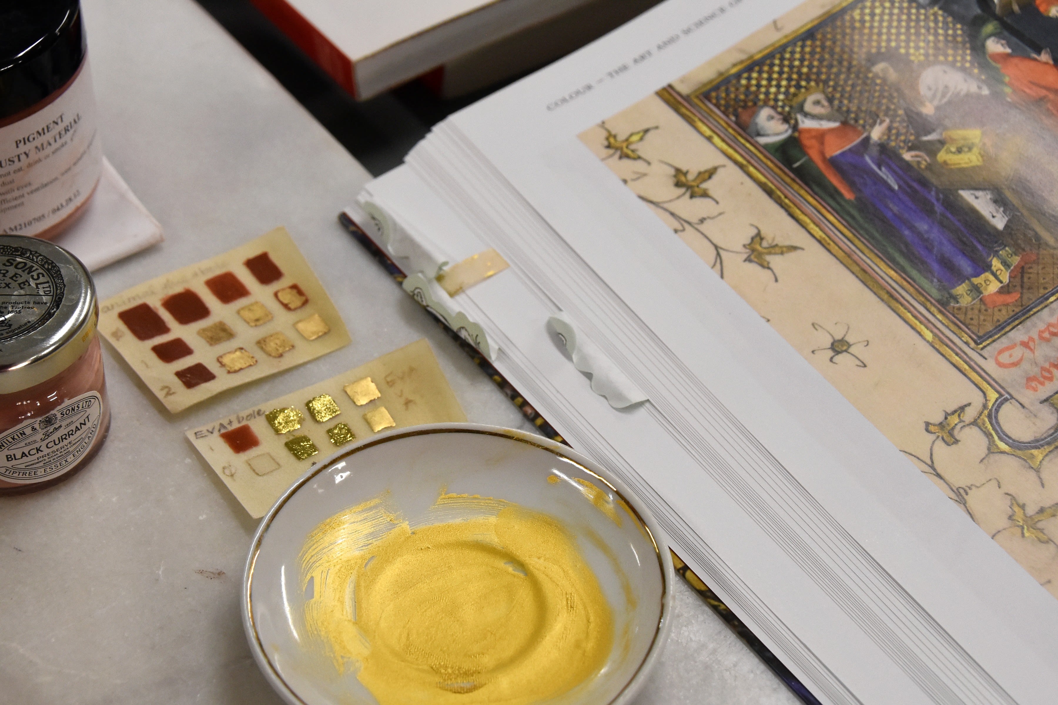 Most luxury manuscripts were illuminated by the addition of gold, either as paint or gold leaf. The paint is known as shell gold, because it was typically kept in a mussel shell.