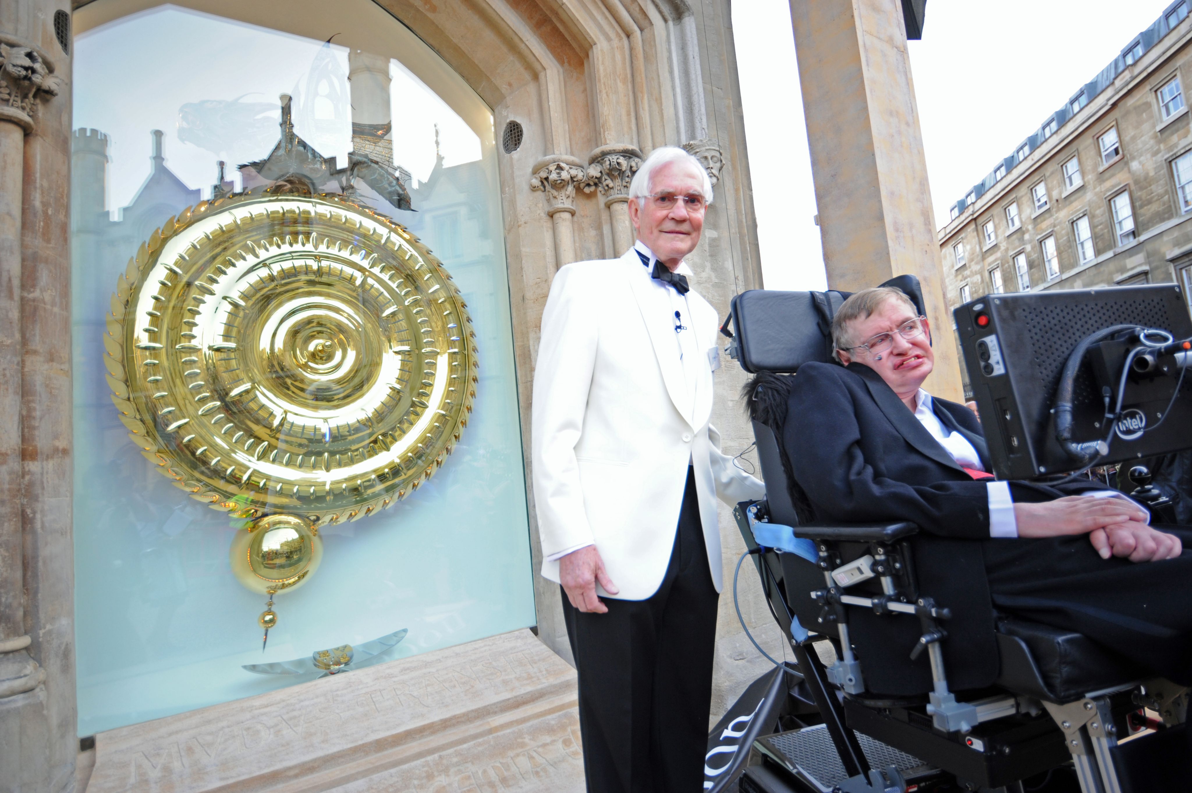 Dr John C Taylor OBE with Professor Stephen Hawking at the opening of the Corpus Chronophage on 19 September 2008.